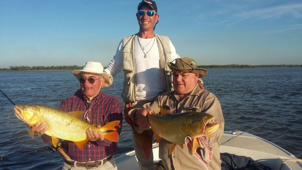 Doble captura de Dorado en el bote